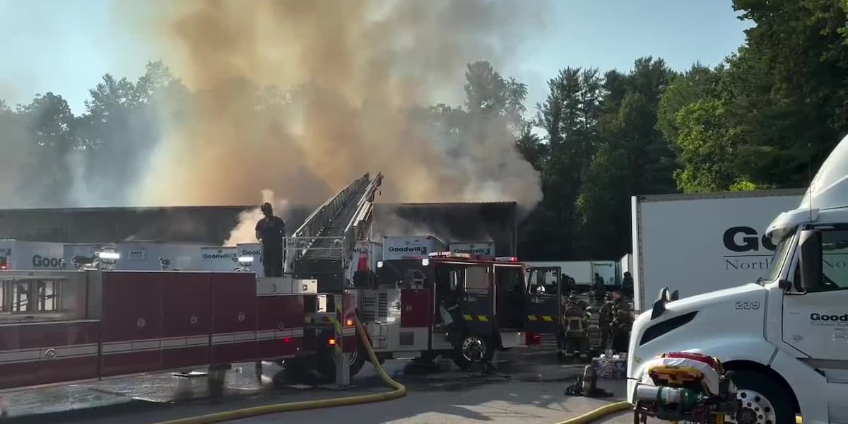 Large business fire shuts down road in Asheville