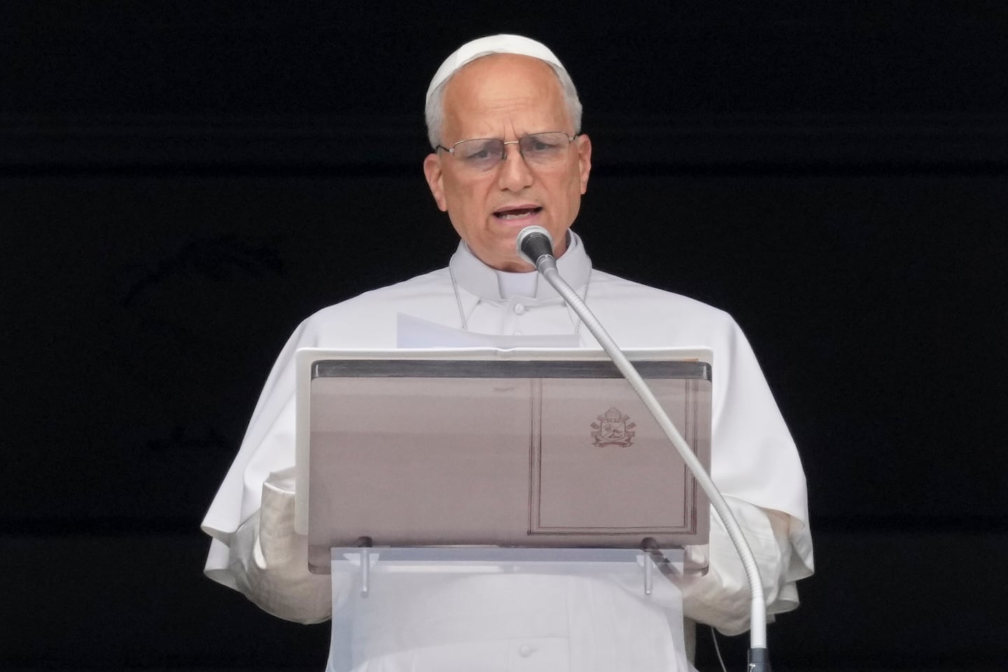 Pope Leo XIV delivered his message as he recited the Regina Coeli noon prayer from the window of his studio overlooking St. Peter's Square at the Vatican on June 22.