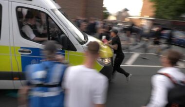 Moment protester at anti-migrant demo is run over by a police van: Thugs clash with officers near asylum hotel after Ethiopian resident was charged over schoolgirl sex assault