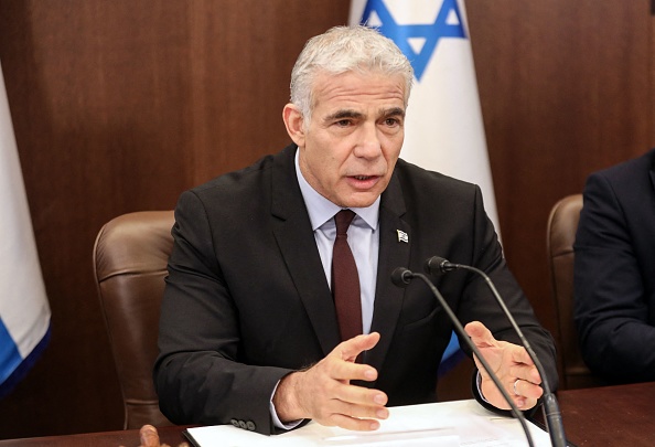 Israeli Yair Lapid at the cabinet meeting in Jerusalem, July 3, 2022, days after the Bennett-Lapid coalition collapsed. (AFP Photo)