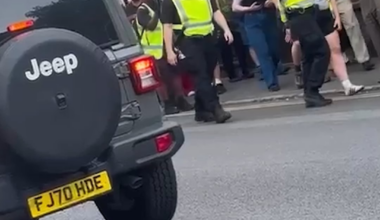 Police have admitted escorting pro-migrant protesters to an asylum hotel at the centre of days of volatile demonstrations
