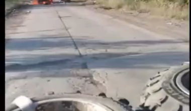 The russian invaders caught sight of burning golf cart, with flames still consuming the corpse of a fellow invader