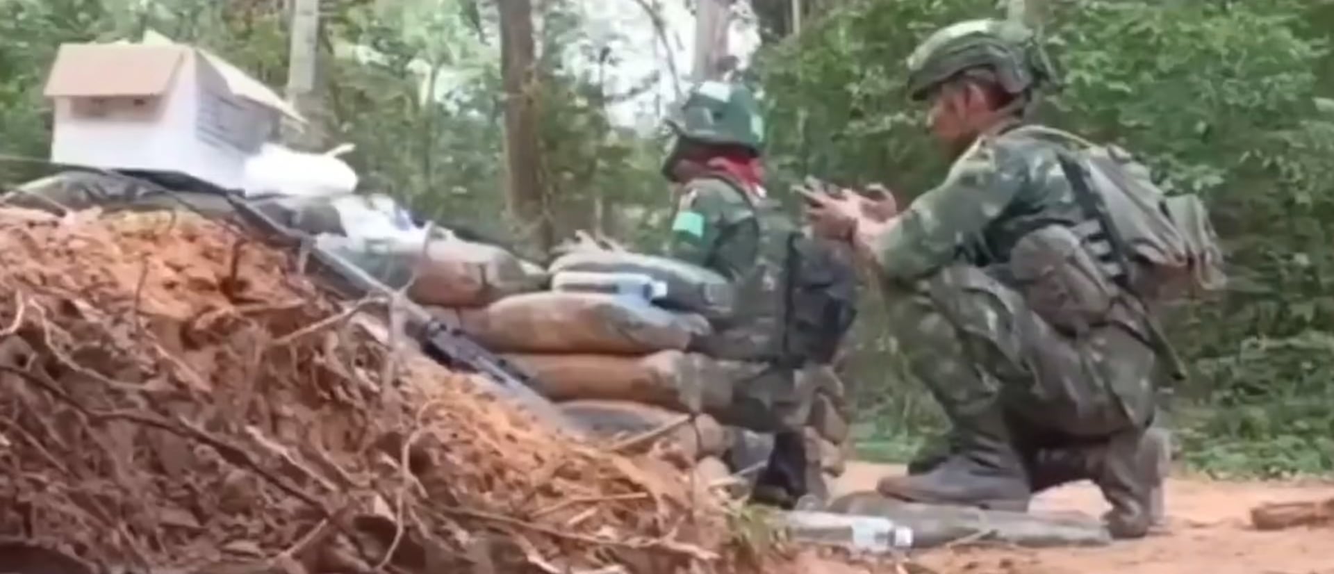 A Cambodian artillery shell lands uncomfortably close to a Thai UAV team, date unknown