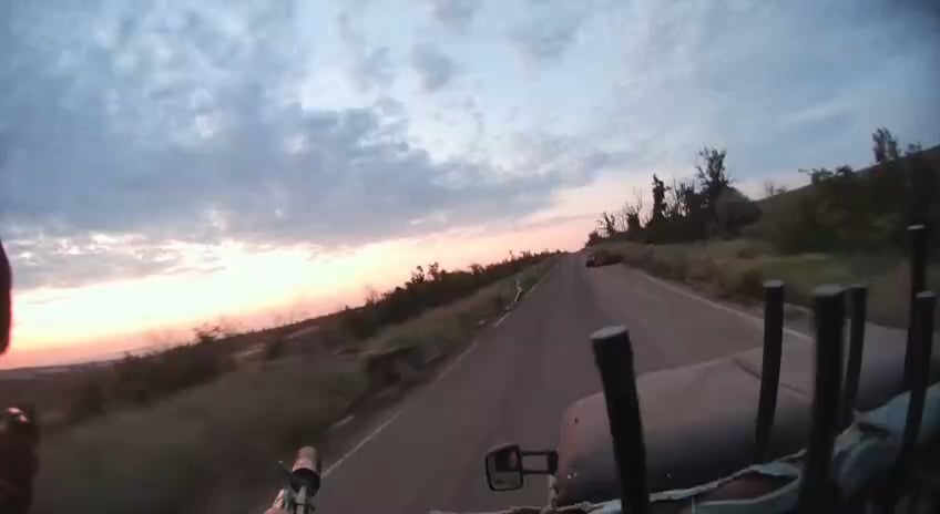 GoPro footage of a Russian soldier reacting promptly to an FPV drone lying in ambush