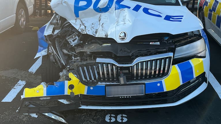 A close-up of damage on a police car after it was repeatedly rammed by a stolen vehicle in Auckland.
