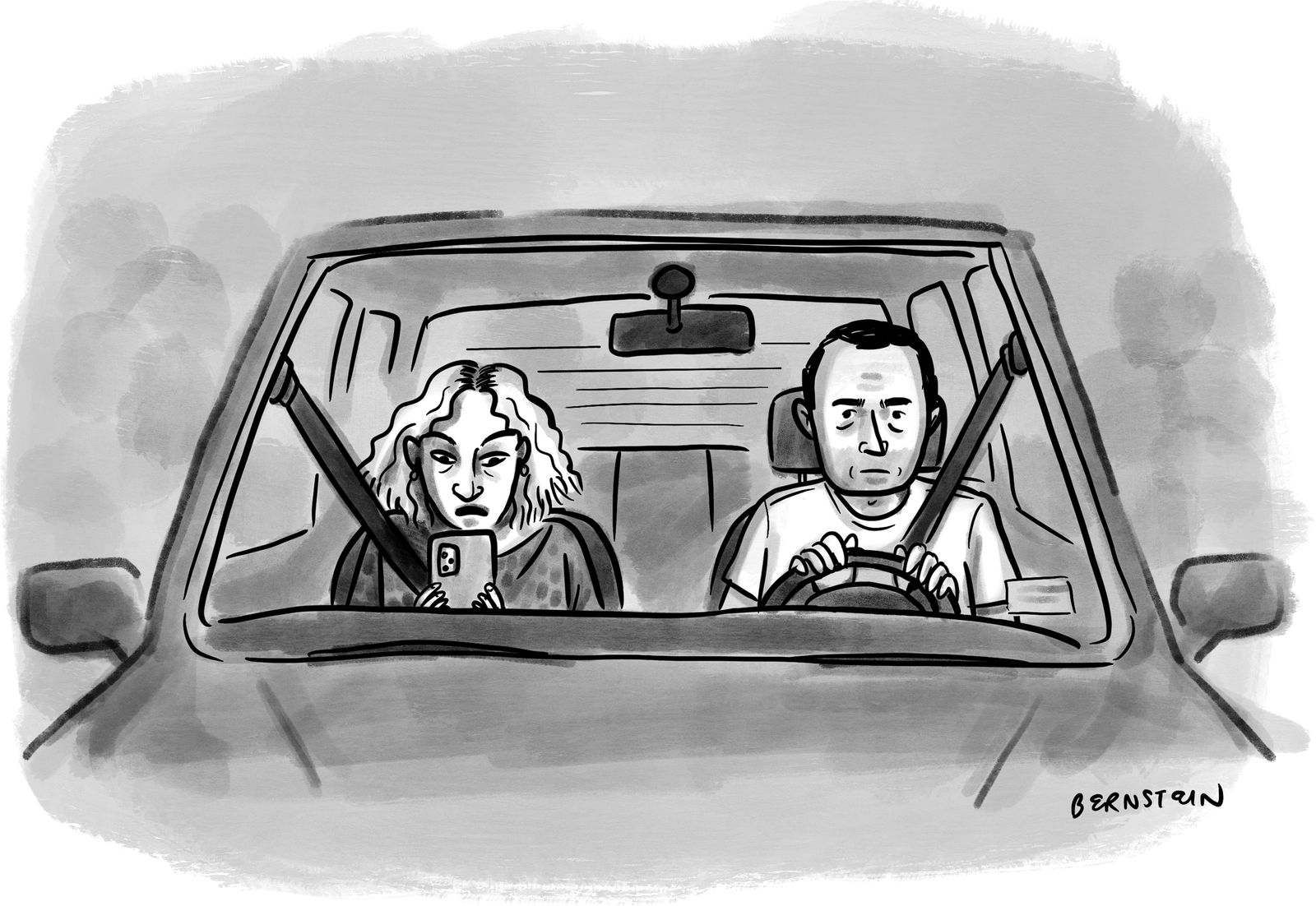 Woman in passenger seat on phone while man drives.