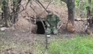 russian soldier fulfills his last decision near his hideout in the way never seen before.  (location and date are not disclosed)