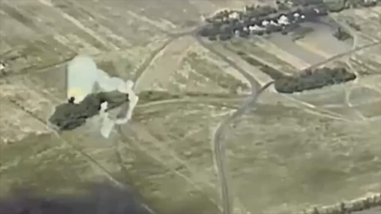 A Russian Strela-10 launches a surface to air missile at a Ukrainian observation drone and then is hit by an FPV Drone.