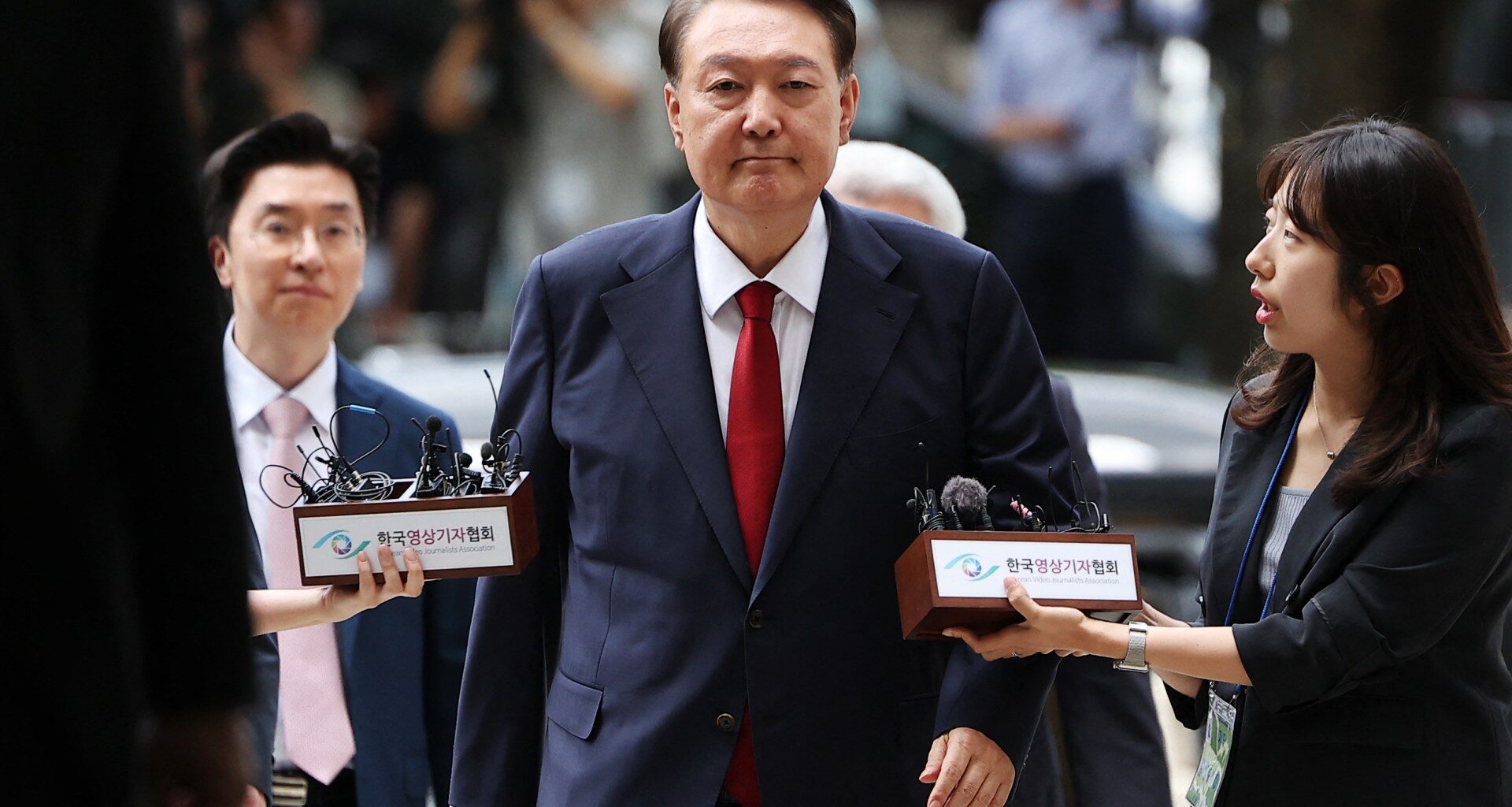 South Korea issues arrest warrant for ex-President Yoon | Politics News