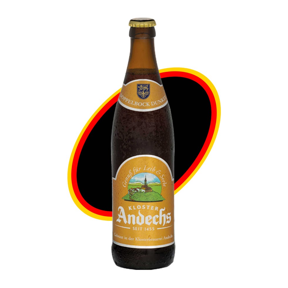 bottle of andechs doppelbock dunkel beer featuring a label with a monastery and mountain design