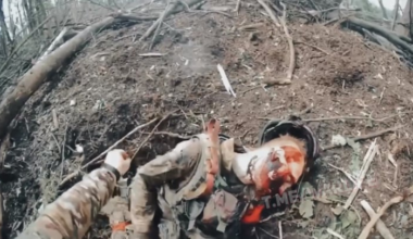 Ukrainian special forces finish off and collect trophies from a Russian assault group destroyed in close combat.