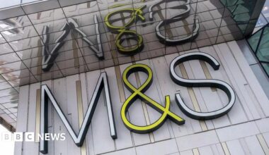 M&S sign on a grey wall
