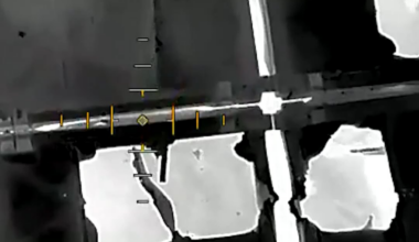 A Ukrainian drone operator drops a charge through a small hole in a Russian pontoon bridge to blow it up from the inside.