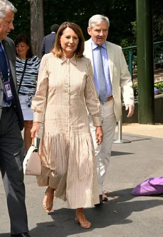 Getty Images Carole and Michael Middleton attend Wimbledon on July 7, 2025, in London, England.
