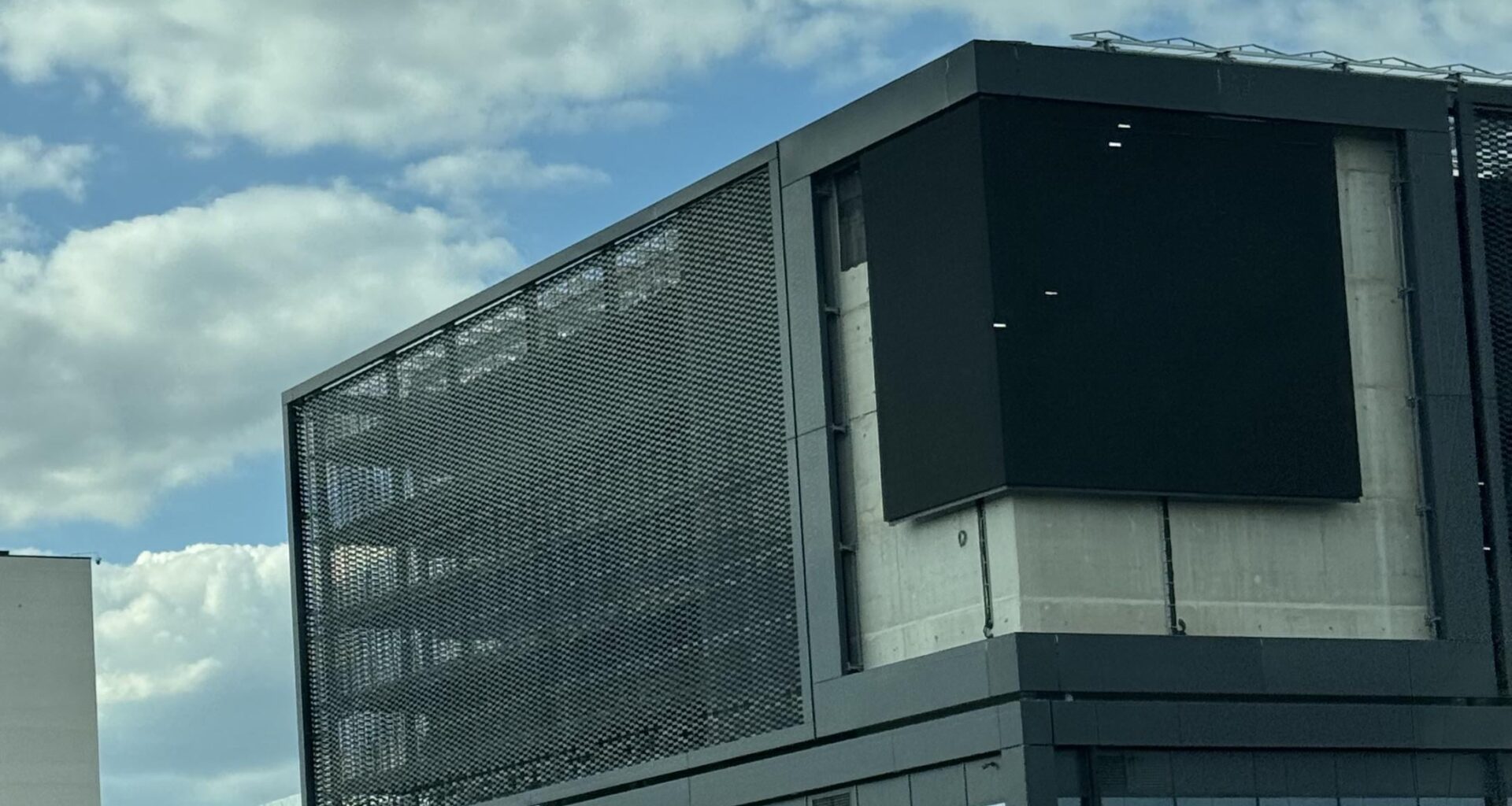 Could it be that their budget was so small that they couldn't cover the wall with the LED panel?