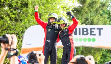 Swede Oliver Solberg (right) and his British co-driver Elliott Edmondson celebrate on the podium after winning the Rally Estonia, the eighth round of the FIA World Rally Championship, on July 20, 2025 in Kaariku.