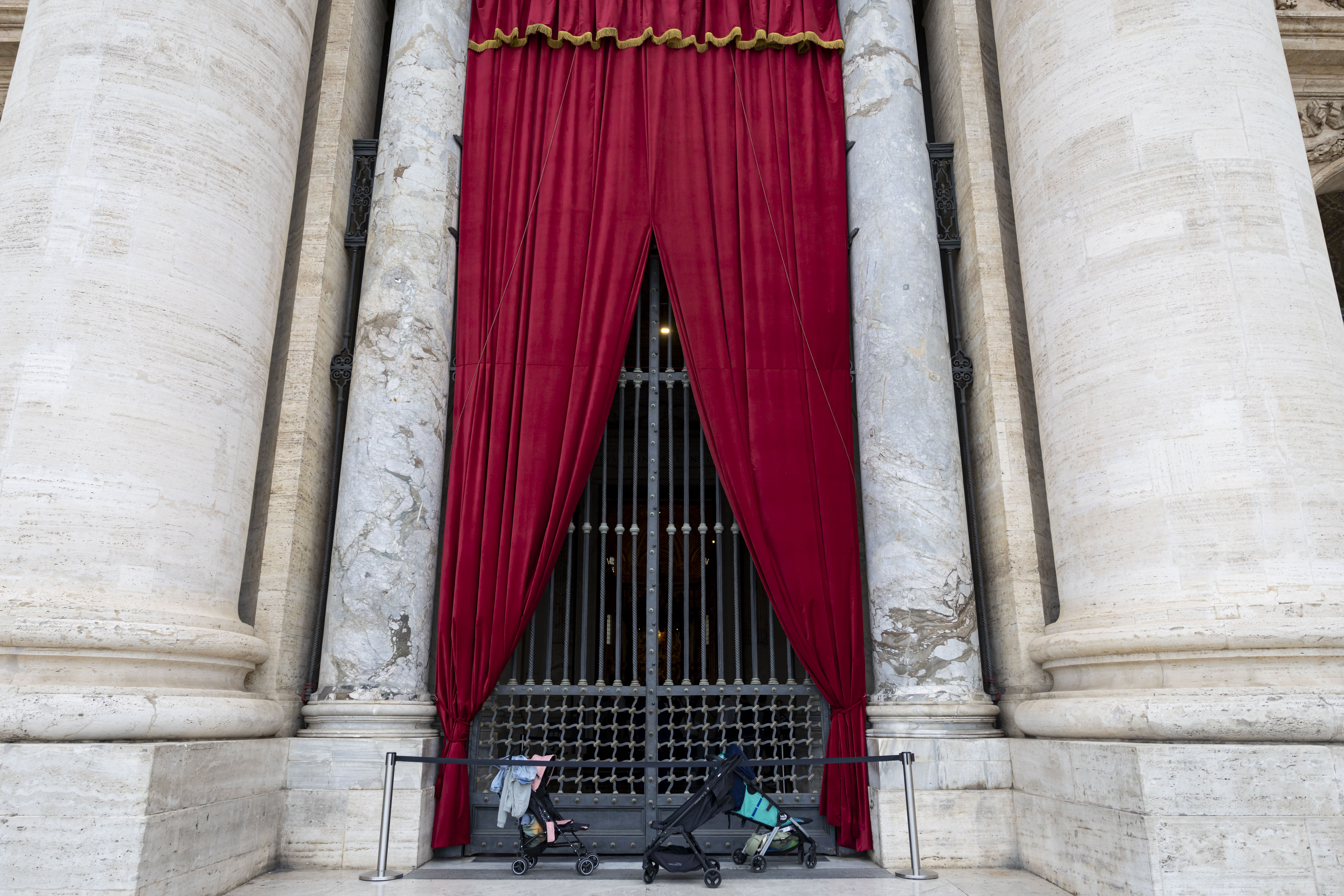 Strollers sit outside St. Peter's Basilica on Thursday, May 15, 2025, before the installation of Pope Leo XIV at the Vatican. (Brian Cassella/Chicago Tribune)