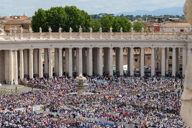 Crowds watch as Pope Leo XIV is installed during Mass in St. Peter's Square on Sunday, May 18, 2025, at the Vatican. (Brian Cassella/Chicago Tribune)