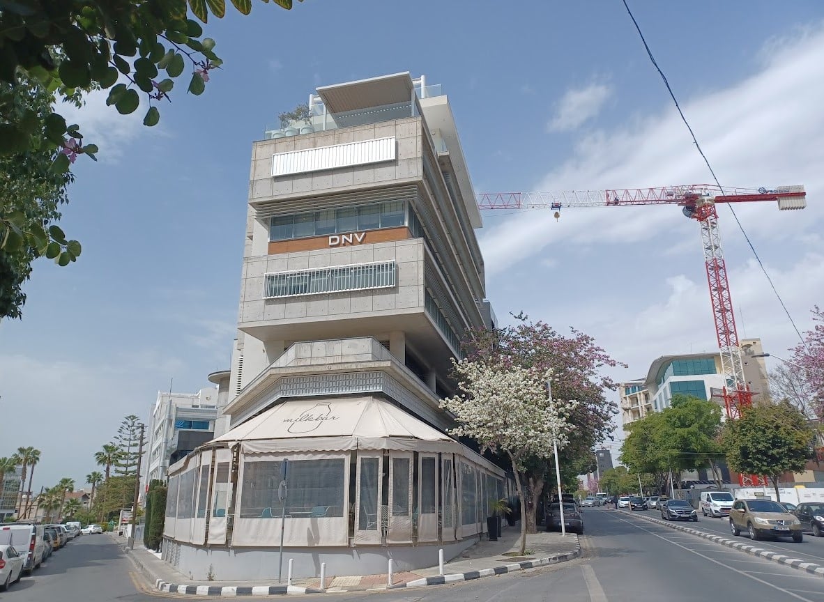 cover Cyprus Business Now: Paphos tourism, Finance Minister, building permits, PwC