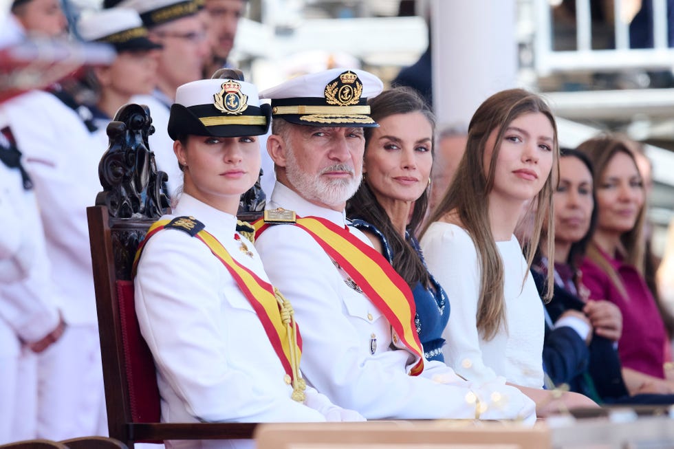 Ceremonial event featuring military officials and guests.