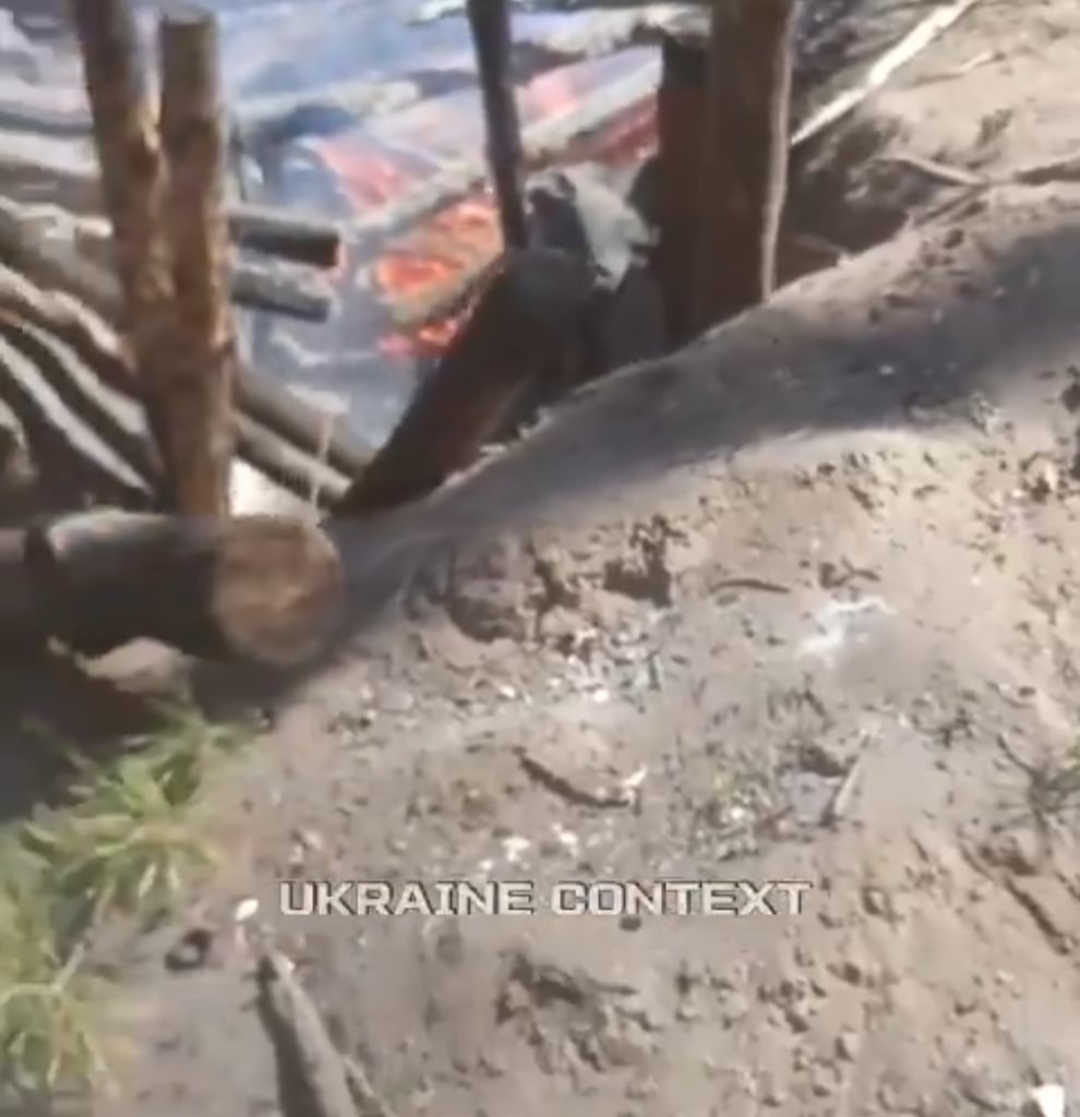 Russian soldiers film their burning positions. July 2025