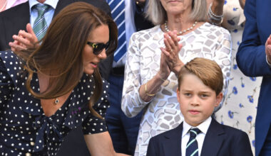 Kate Middleton wears a polka dot dress and sunglasses and talks to son Prince George who wears a navy suit with a striped tie
