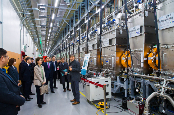 Cho Seong-kyung, then-first vice minister of science and ICT, inspects the heavy ion accelerator facility at the Institute for Rare Isotope Science in Yuseong District, Daejeon, on Dec. 12, 2023. [MINISTRY OF SCIENCE AND ICT]