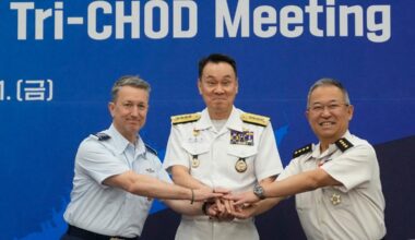 General Yoshihide Yoshida, Chief of Staff, Joint Staff of Japan, Admiral Kim Myung-soo, chairman of the South Korean Joint Chiefs of Staff, and John Daniel Caine, chairman of the U.S. Joint Chiefs of Staff, pose during a Trilateral Chiefs of Defense meeting at the Defense Ministry in Seoul, South Korea, Friday, July 11, 2025.     Ahn Young-joon/Pool via REUTERS