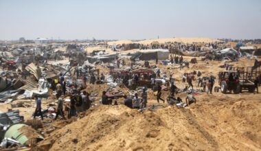 Palestinians inspect destruction at a makeshift displacement camp following a incursion by Israeli tanks in Khan Yunis, southern Gaza strip on July 11, 2025. (AFP Photo)