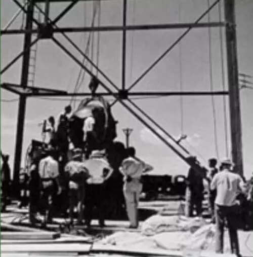 GADGET HOISTED UP THE TOWER