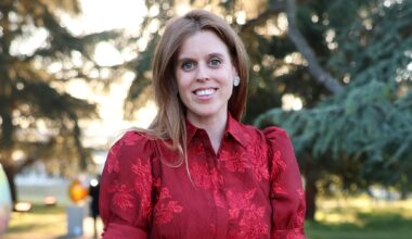 Princess Beatrice, wearing a red maxi dress, smiles as she attends The Elephant Family Evening of Art and Conservation at Kew Gardens on May 13, 2025