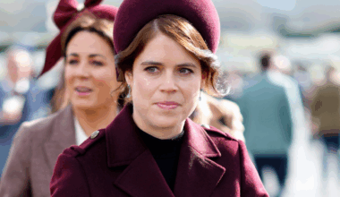 Princess Eugenie wears a burgundy coat and matching hat