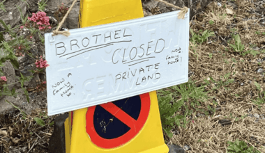 Family put up sign advertising their house is no longer a brothel
