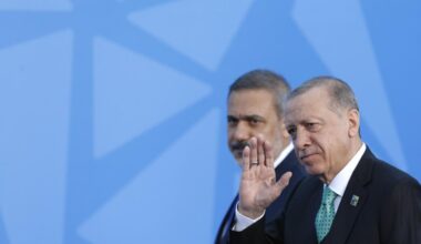 President Recep Tayyip Erdogan (R), and Turkish Foreign Minister Hakan Fidan (L) arrive at NATO Heads of State and Government Summit in Vilnius, Lithuania on July 12, 2023. (Photo by Aytac Unal / ANADOLU AGENCY / Anadolu via AFP)
