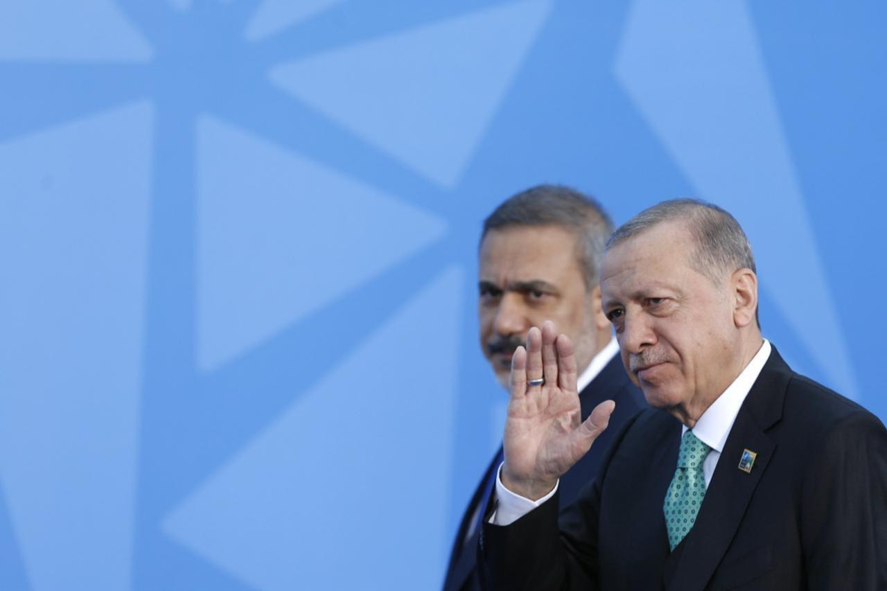 President Recep Tayyip Erdogan (R), and Turkish Foreign Minister Hakan Fidan (L) arrive at NATO Heads of State and Government Summit in Vilnius, Lithuania on July 12, 2023. (Photo by Aytac Unal / ANADOLU AGENCY / Anadolu via AFP)