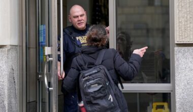 A security guard turns away a person trying to get into the USAID building in Washington on February 3 2025