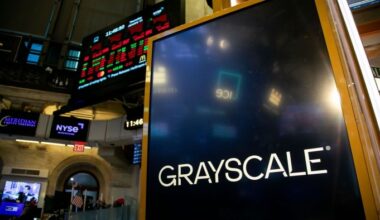 Grayscale signage on the floor of the New York Stock Exchange