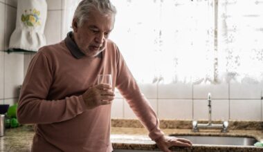 Senior man feeling pain at home