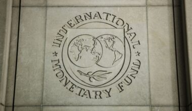 The International Monetary Fund's logo is pictured at its headquarters in Washington, DC.