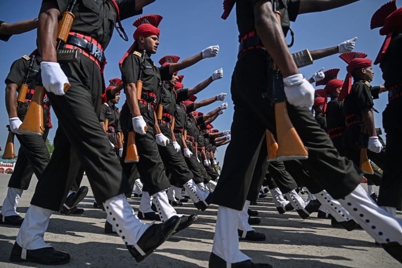 Newly recruited Indian Army soldiers from the Jammu and Kashmir Light Infantry (JAKLI) take part in a parade at the JAKLI Army headquarters in Srinagar, Indian-administered Kashmir, on June 5.