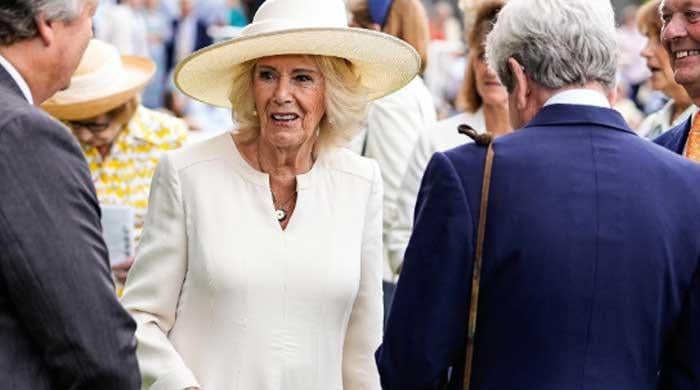 Queen Camilla attends race honoring her in-laws