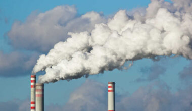3 chimneys and smoke.