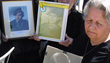 cover Relatives of missing persons march to crossing point, hand resolution