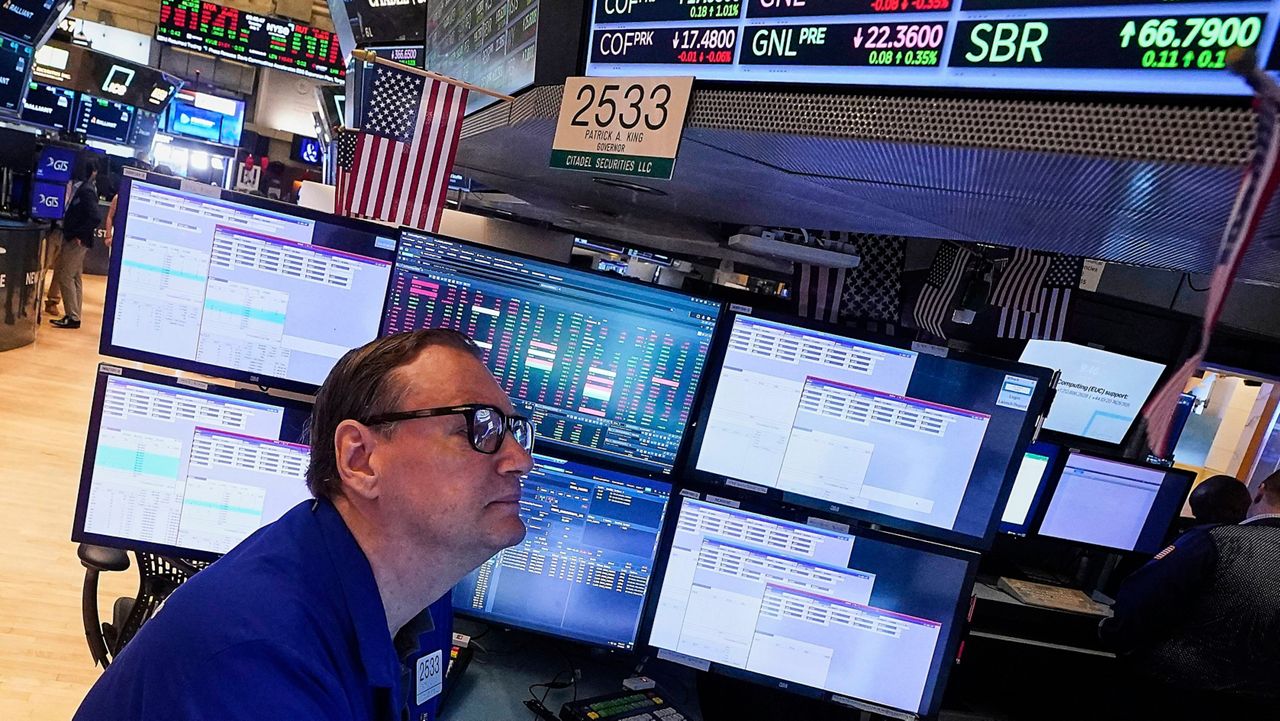Specialist Patrick King works on the floor of the New York Stock Exchange, Tuesday, July 1, 2025. (AP Photo/Richard Drew)