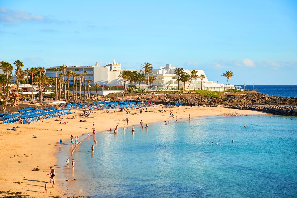 Panoramic view of Playa Blanca beach in Lanzarote, Spain.