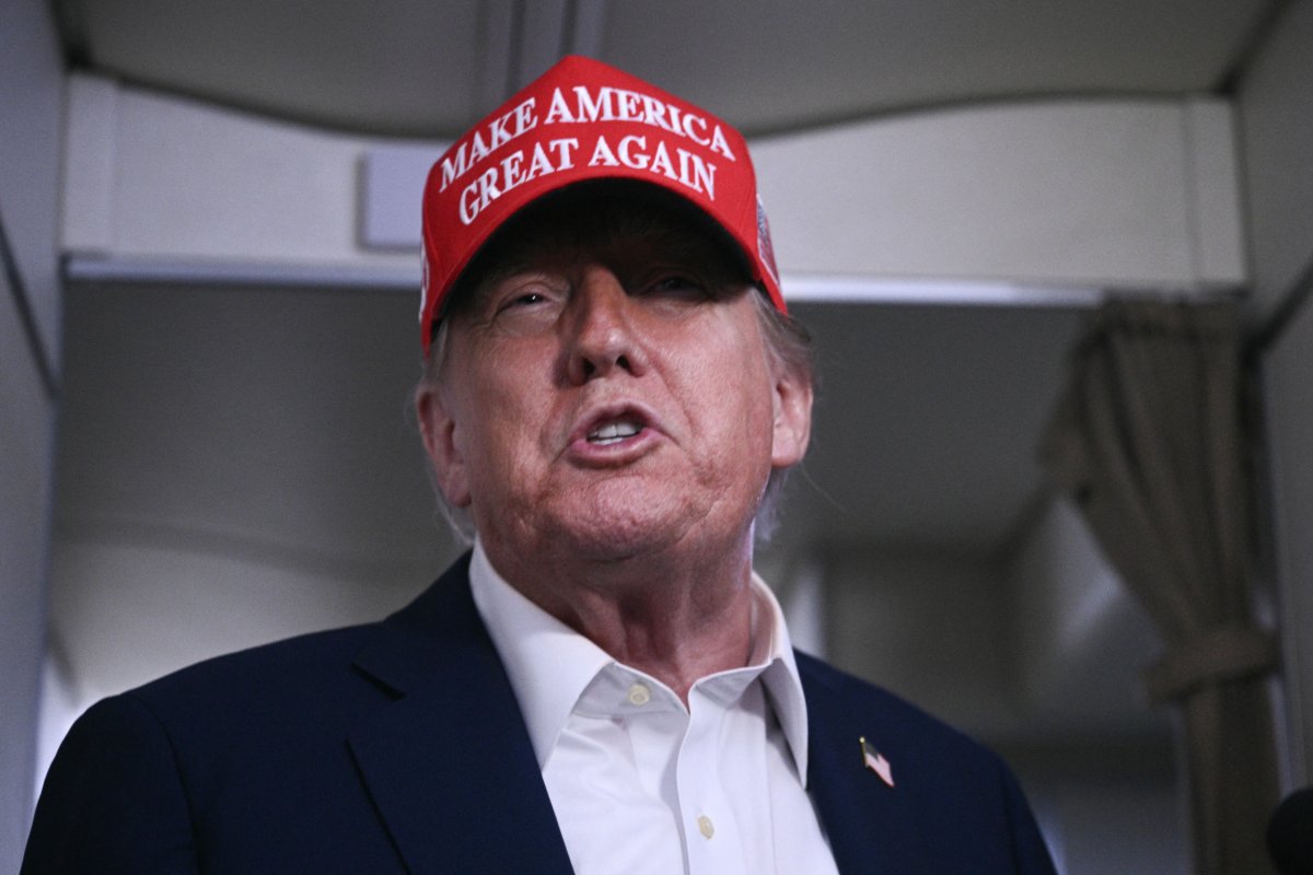 President Donald Trump speaks to journalists