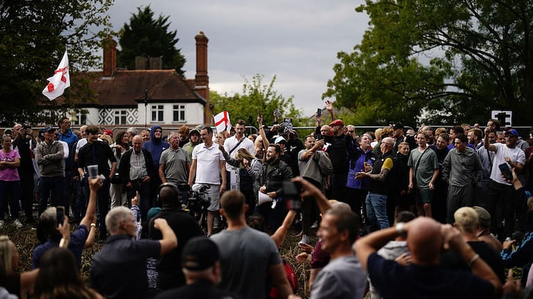 Protesters near the Bell Hotel in Epping, London