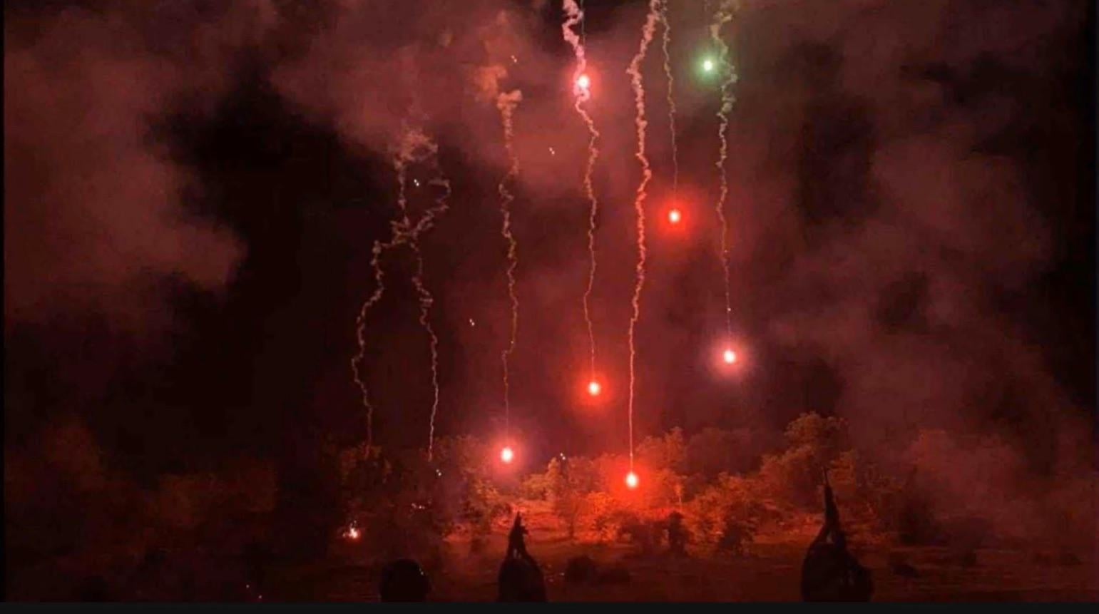 Flairs lighting the battlefield during Cambodian assaults on Ta Kwai temple on the final hours of conflict.