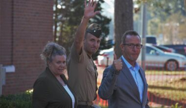Lt. Col. Stu Scheller leaves court-martial.
