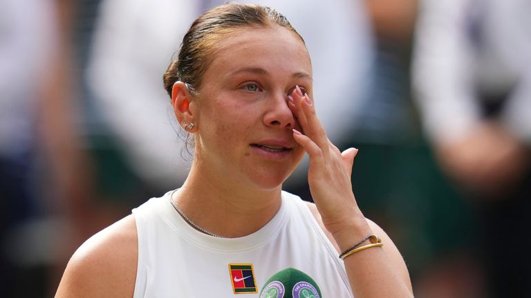 Amanda Anisimova of the U.S. reacts after losing the women's singles final match against Iga Swiatek of Poland at the Wimbledon Tennis Championships in London, Saturday, July 12, 2025.(AP Photo/Kirsty Wigglesworth)